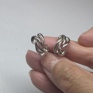 Silver toned puffy geometrical floral swirl clip on screw back Earrings